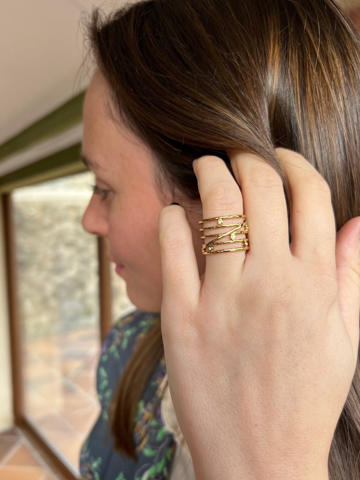 Anillo ajustable circonitas en color oro
