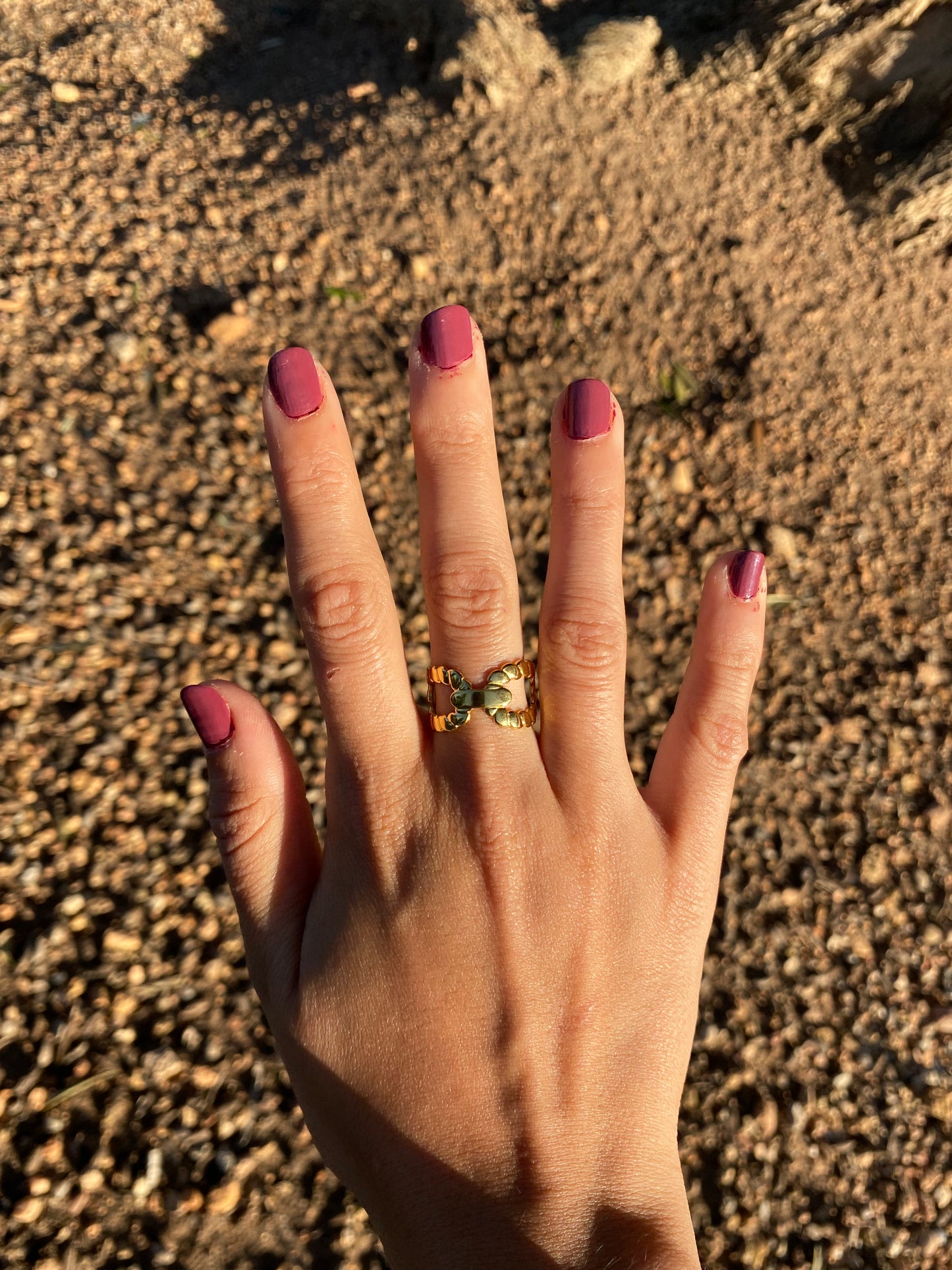 Anillo ajustable con círculos de acero inoxidable en oro