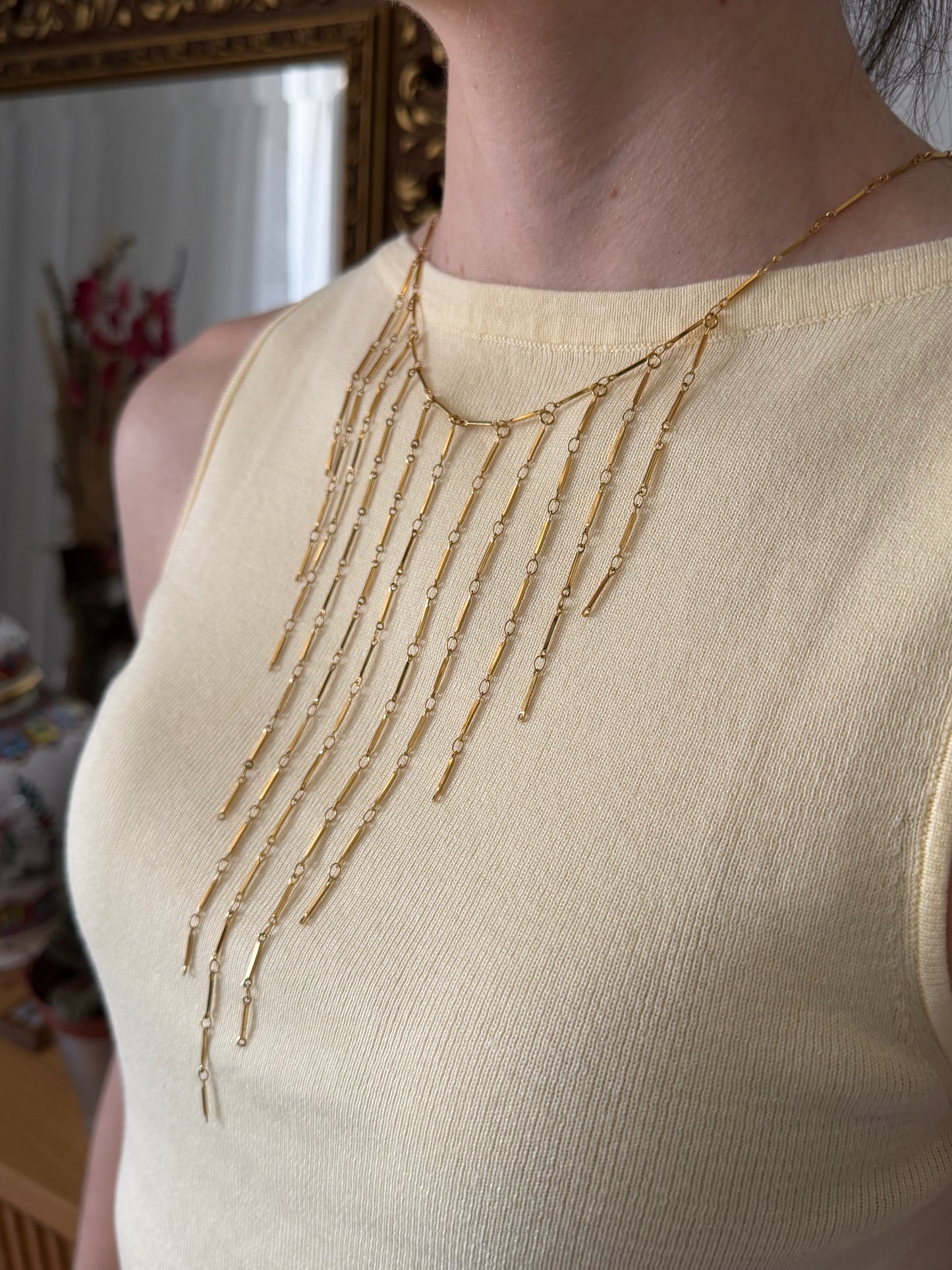 Collar con varias tiras de acero inoxidable en cascada en color oro